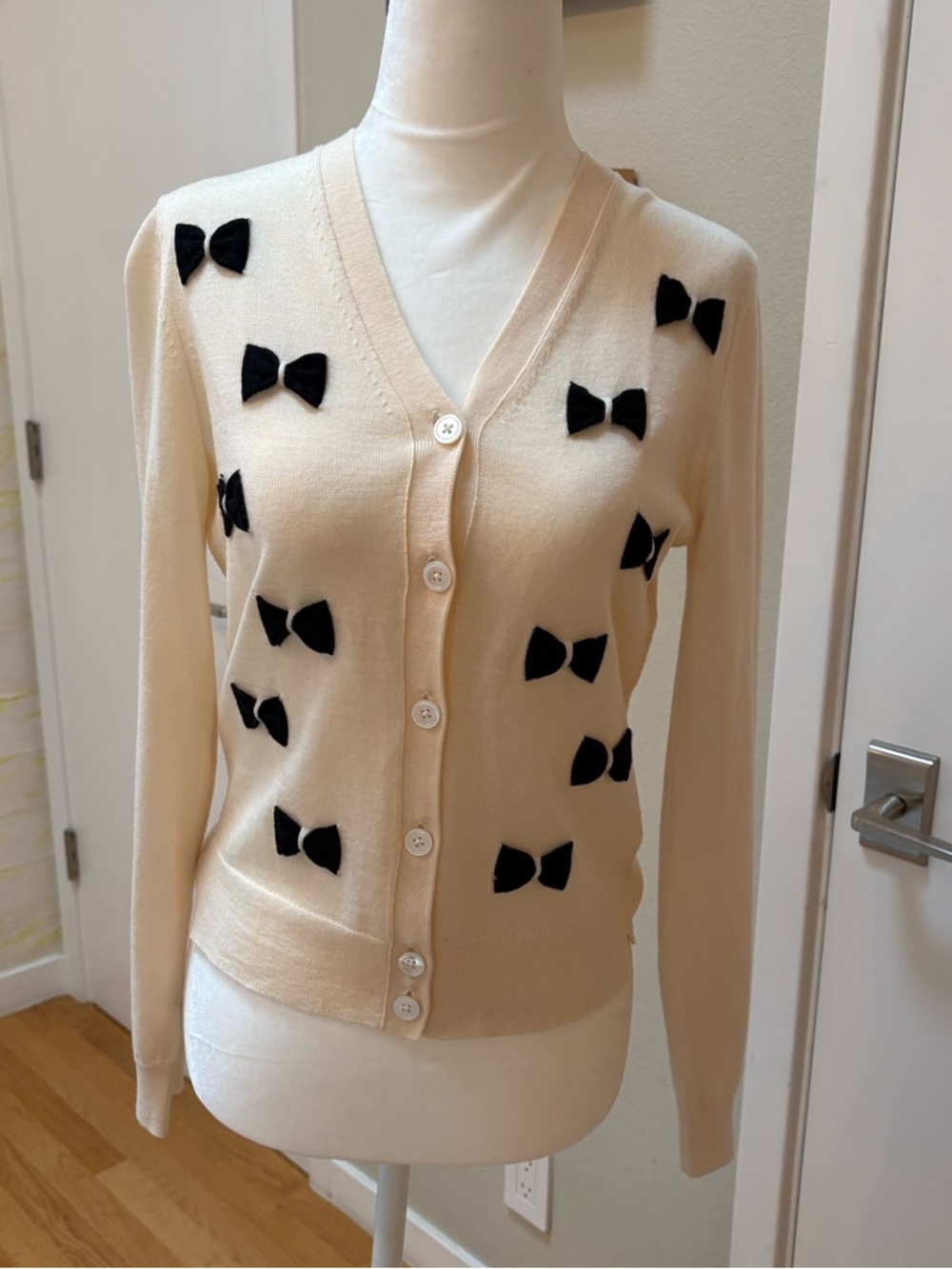 Marc Jacobs Cream Cardigan with Black Bow Accents